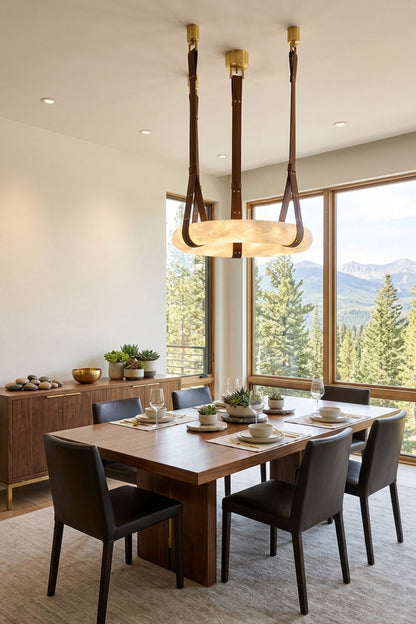 Nerissa Alabaster Ring Leather Pendant Light | Natural Alabaster, Leather and Brass | Displayed in a formal dining space with panoramic mountain views | vexa lamps