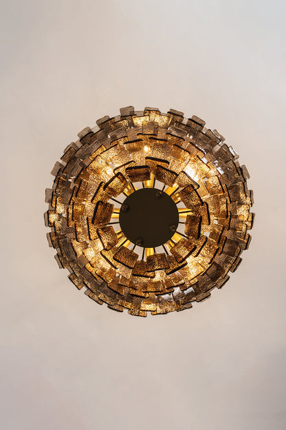 Octavia Sculptural Smoked Glass Chandelier | Bottom-Up View | Direct bottom-up look at the fully illuminated multi-tiered circular chandelier showcasing concentric rings of glowing glass | vexa lamps