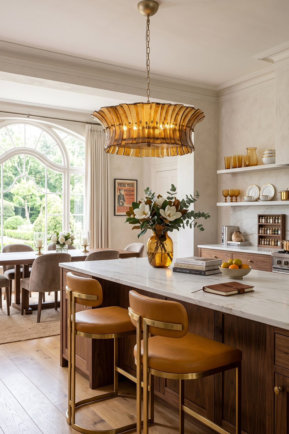 Octavia Sculptural Smoked Glass Chandelier | Kitchen Island Lighting | Hanging as a luxurious centerpiece over a rich wooden island counter with leather barstools in a bright contemporary kitchen | vexa lamps