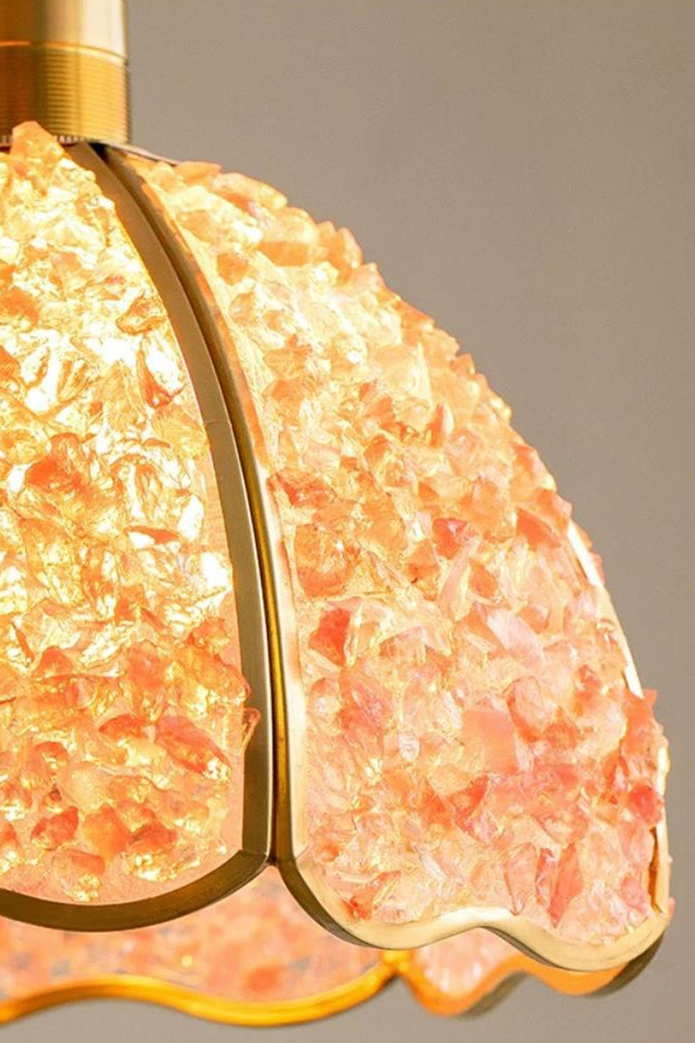 Close-up of Ondine Mosaic Glass Pendant Light showcasing the scalloped brass-toned frame and crushed glass chips.
