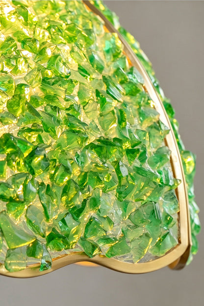 Close-up of the Ondine Mosaic Glass Pendant Light showcasing vibrant green crushed glass in a scalloped brass-toned frame.
