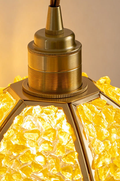 Close-up of the Ondine Mosaic Glass Pendant Light showcasing its brass-toned frame and yellow crushed glass chips.