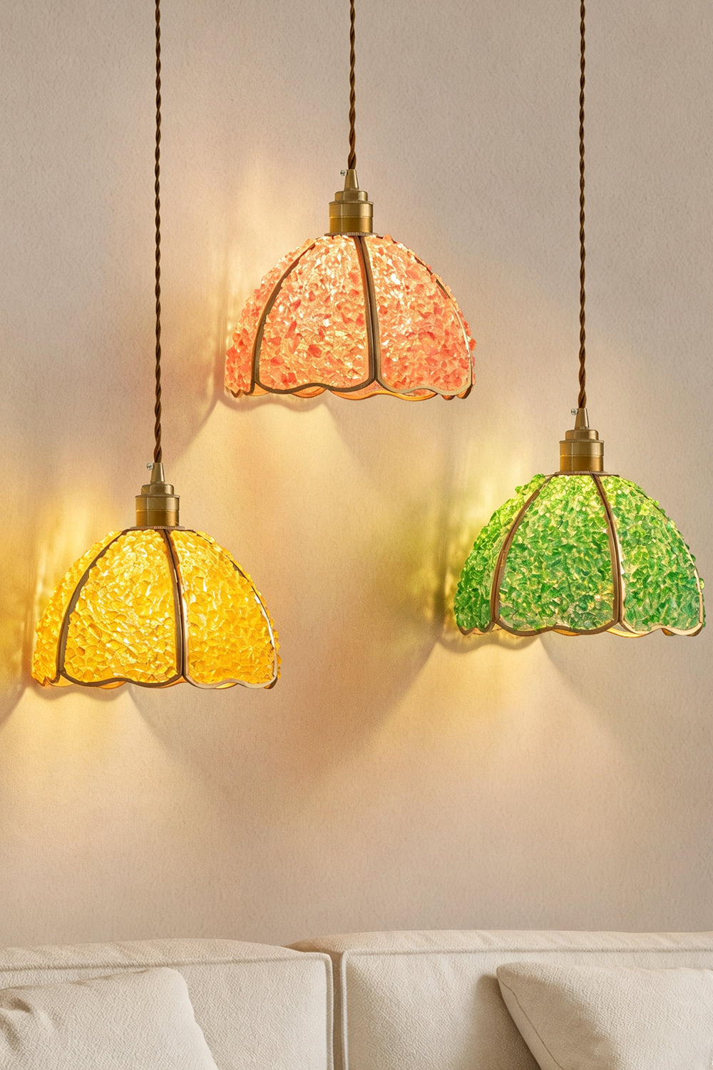 Ondine Mosaic Glass Pendant Light in pink, green, and yellow hues illuminating a cozy setting.