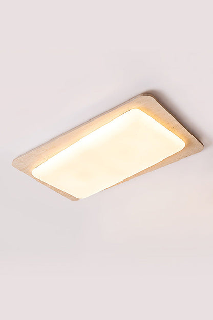 Angled product shot of travertine ceiling light | Yellow Travertine, Acrylic | Lit view isolated on white background | vexa lamps