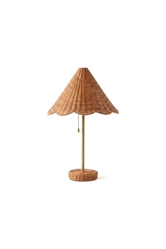 Osrilla Scalloped Rattan Table Lamp | Rattan, Brass | Isolated product shot of a bohemian style table lamp featuring a scalloped conical woven rattan shade and matching wrapped rattan base connected by a slim brass stem | White background | vexa lamps