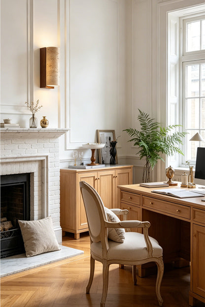 Outcrop Beige Travertine Wall Sconce | Travertine, Metal | Styled in a refined home library or study room, radiating elegant accent light next to a classical fireplace and wooden desk | vexa lamps
