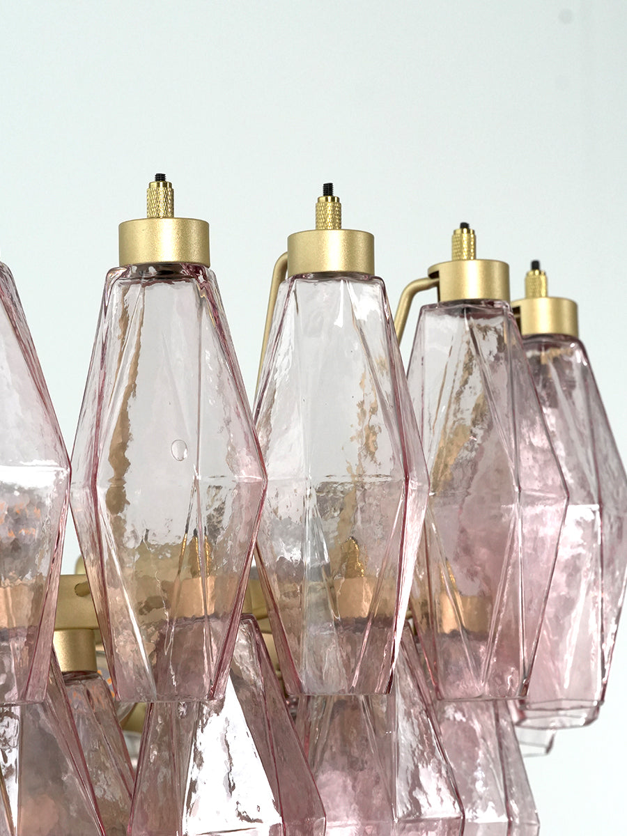 Close-up of pink glass prisms and brass caps | Metal, Glass | Detail shot showing the hardware connections | vexa lamps