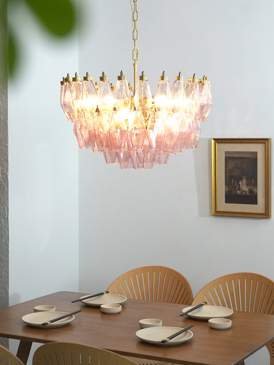 Pink glass polyhedron chandelier in a traditional dining room | Metal, Glass | Over a wooden table with wicker chairs | vexa lamps