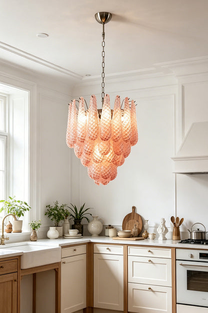 Amara Blush Cascading Glass Chandelier | Glass, Metal | Providing warm ambient light in a bright classic kitchen with cream cabinetry and wood floors | vexa lamps