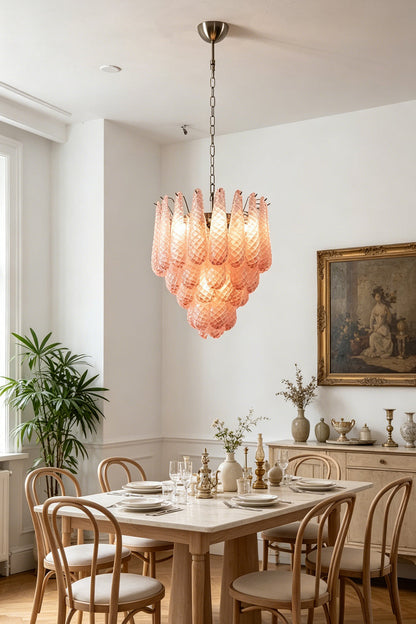 Amara Blush Cascading Glass Chandelier | Glass, Metal | Suspended over a wooden dining table and chairs in a bright, classically styled dining room | vexa lamps