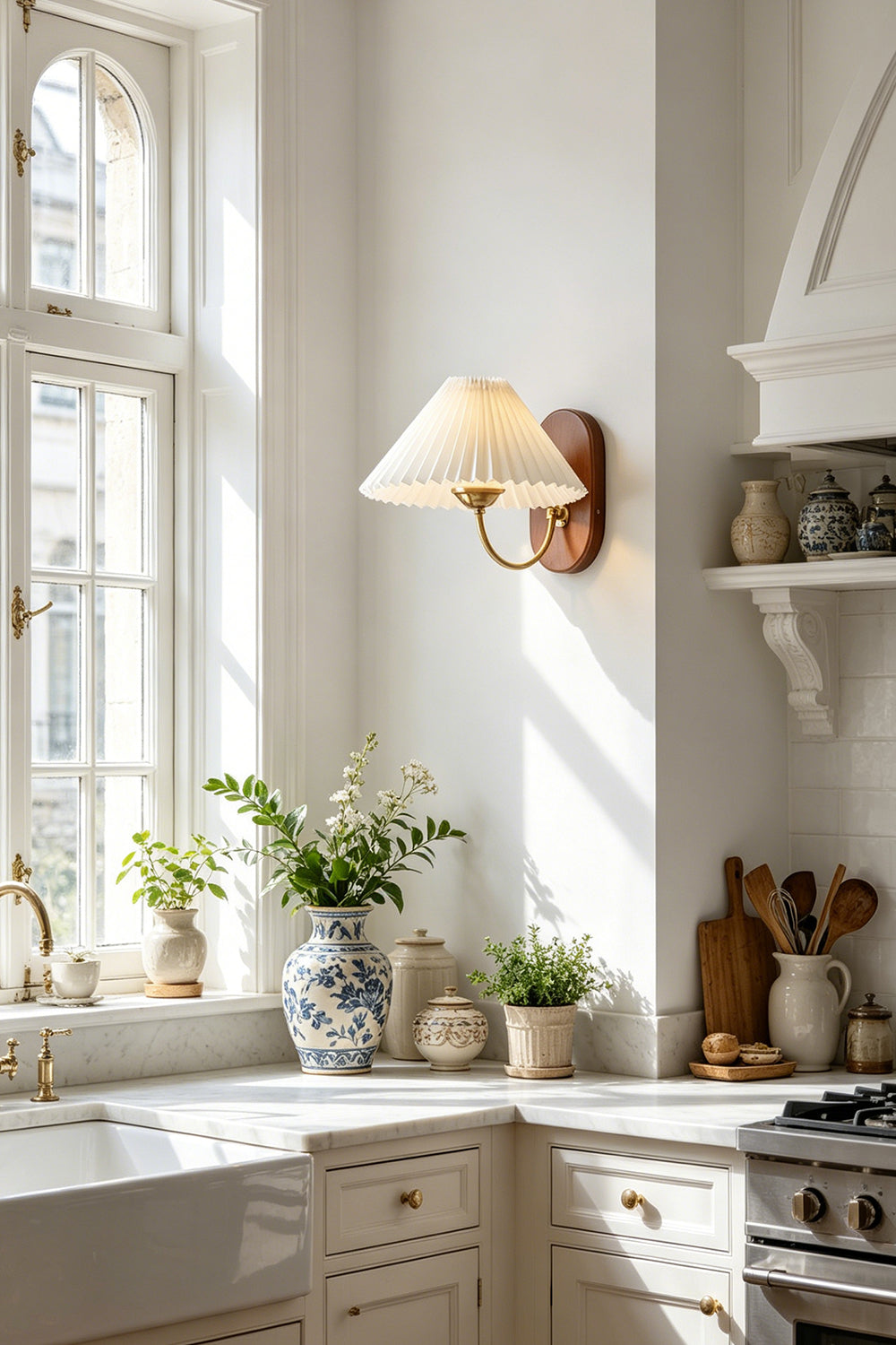 Pleated Fabric Wall Lamp | Fabric, Metal, Wood | Wall-mounted near a bright window over a modern classic kitchen counter with white cabinetry | vexa lamps