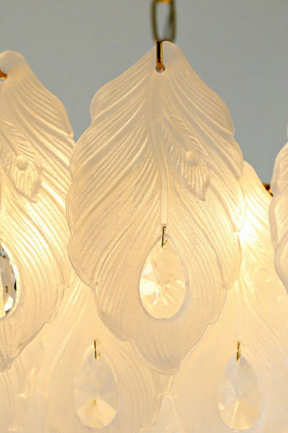 Pluma Frosted Glass Feather Chandelier | Glass, Metal | Macro close-up focus on the illuminated textured frosted white glass feathers and clear dangling crystal teardrops | Detail shot | vexa lamps