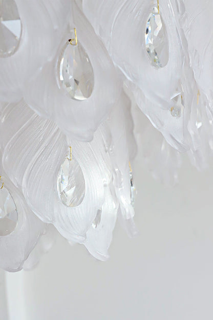Pluma Frosted Glass Feather Chandelier | Glass, Metal | Detailed close-up profile showing the overlapping layered frosted glass feather panels and smooth clear crystal pendants under bright studio light | Detail shot | vexa lamps