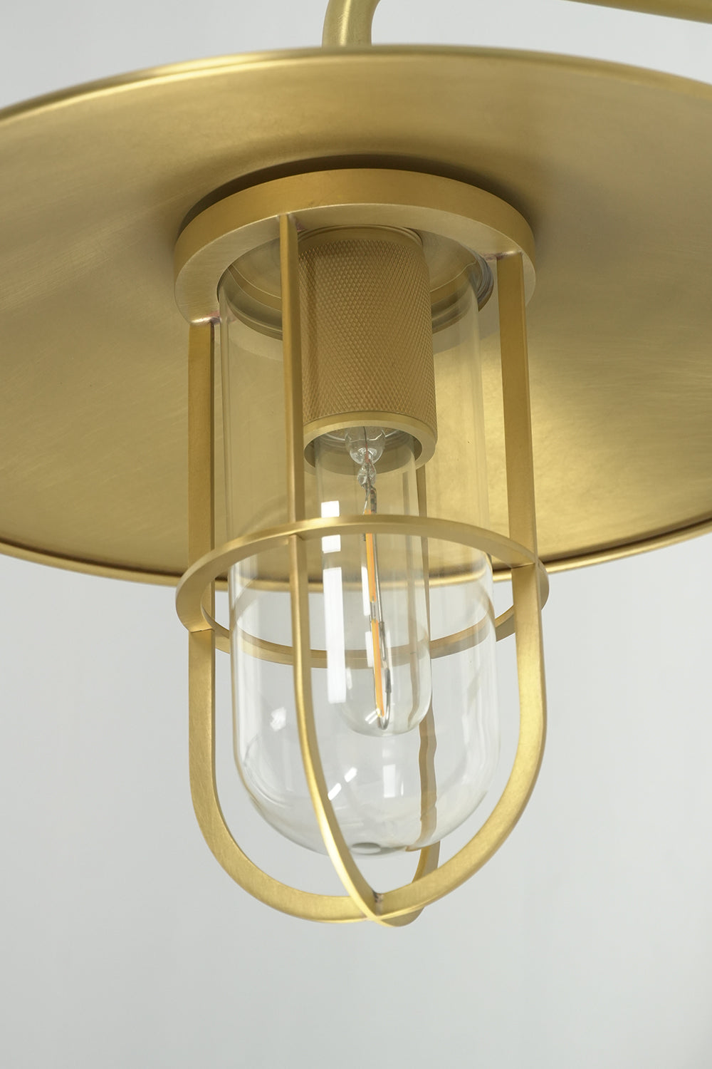 Detailed view of the brass cage and glass tube | Brass, Glass | Macro shot of the Portree lamp head | vexa lamps