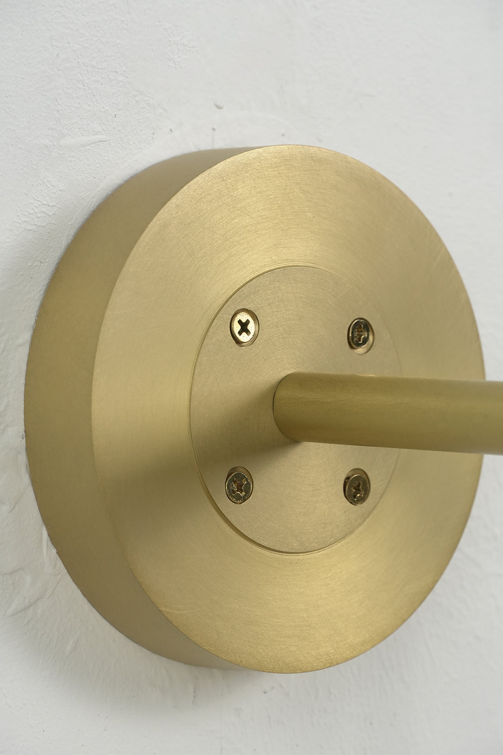 Brass mounting backplate for Portree wall light | Brass | Detailed view of the circular wall mount | vexa lamps