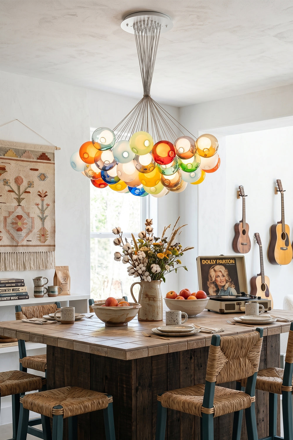 Rainbow Glass Bubble Cluster Chandelier | Glass, Metal | Providing a playful pop of color over a square wooden dining table in a warm bohemian room with guitars | vexa lamps