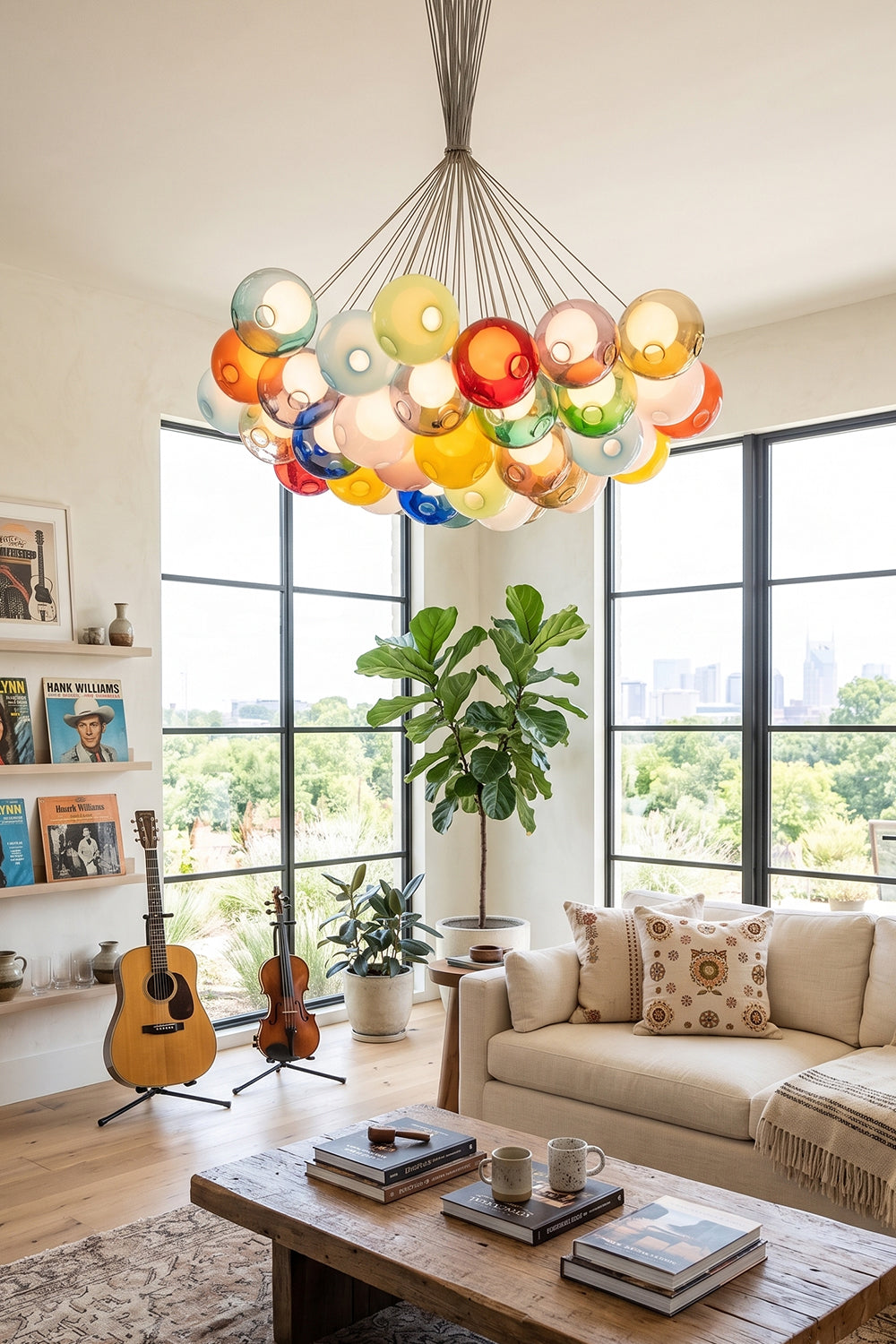 Rainbow Glass Bubble Cluster Chandelier | Glass, Metal | Illuminating a bright, contemporary lounge room featuring a cream sectional sofa and large windows with greenery views | vexa lamps