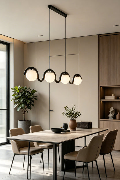 Linear rhythmic flow pendant light over a dining table | Metal, Glass | Interior scene with a large wooden dining set | vexa lamps