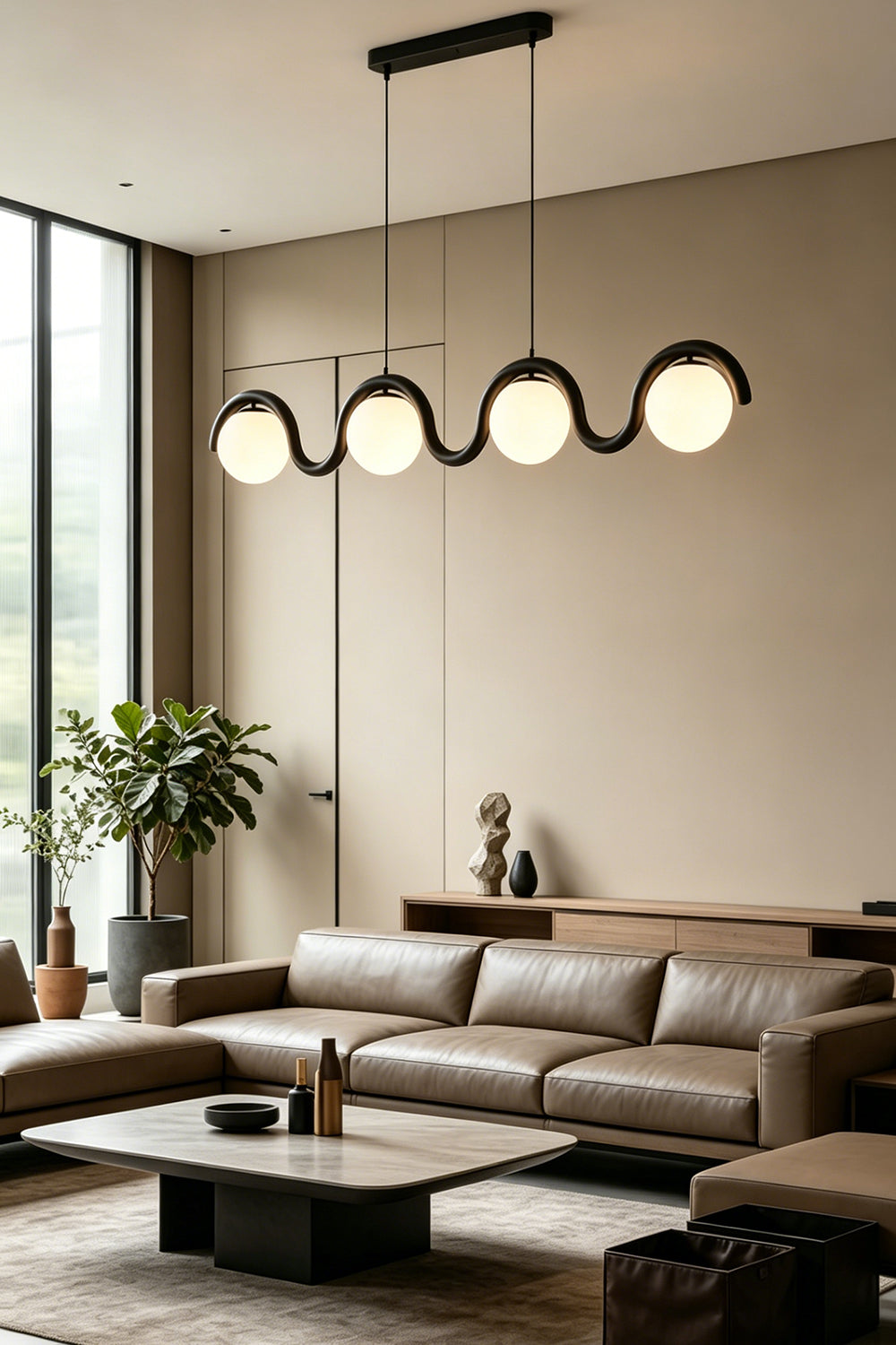 4-light linear rhythmic flow pendant in black finish | Metal, Glass | Modern living room interior with a leather sofa | vexa lamps