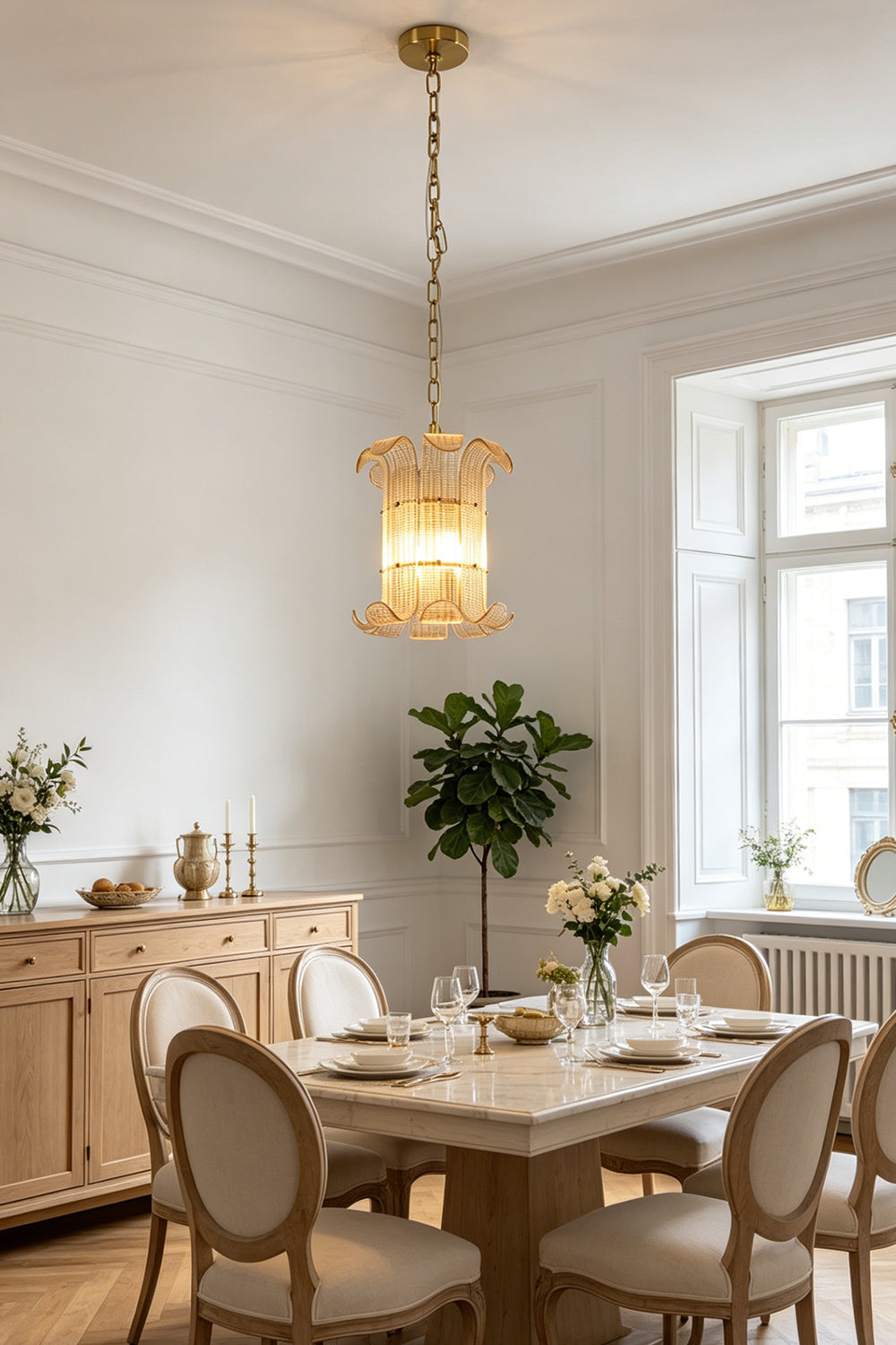 Elegant scroll ribbed glass chandelier | Metal | Glass | Installed in a sophisticated dining room interior | vexa lamps