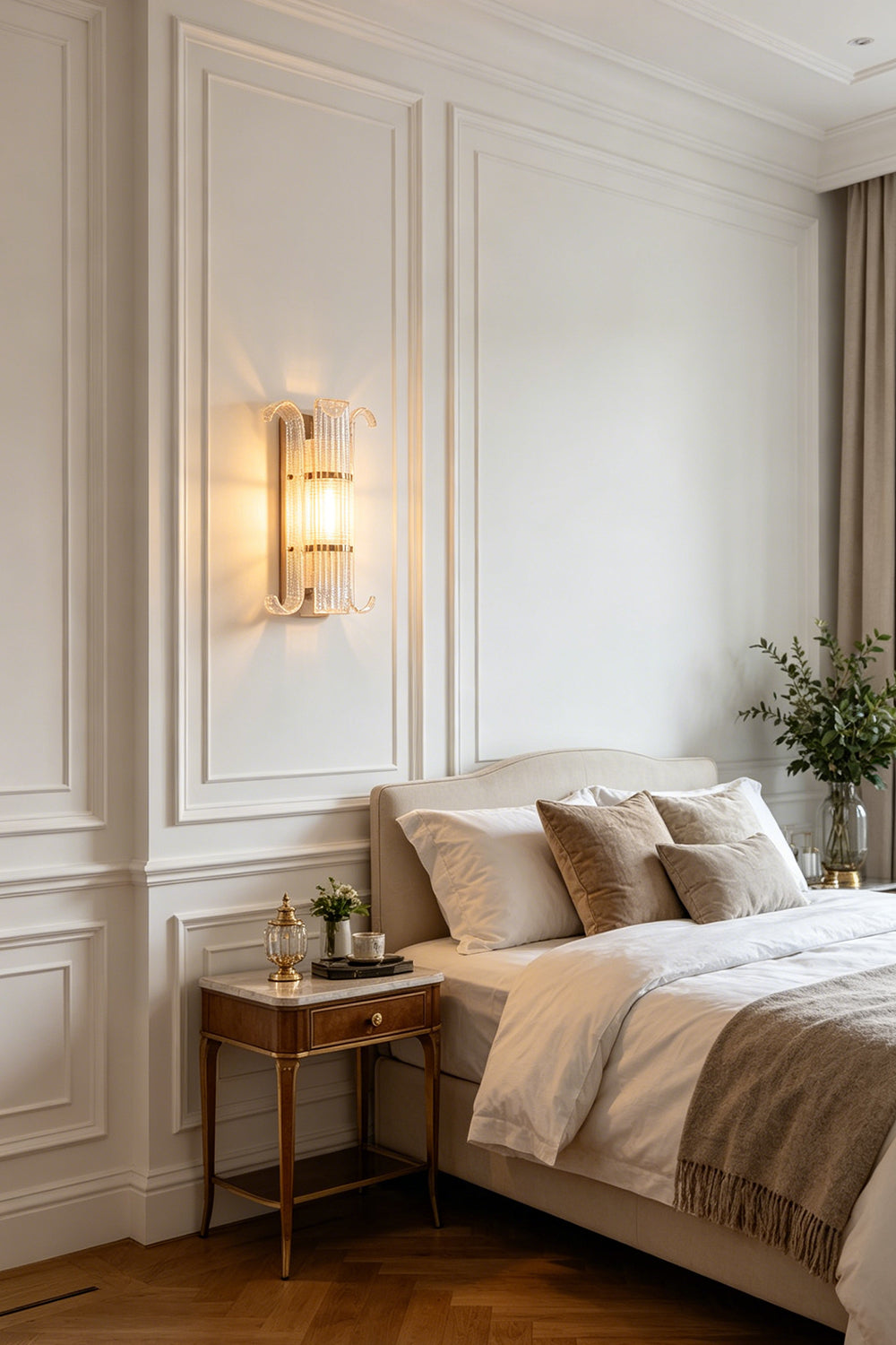 Ribbed Glass Scroll Wall Lamp providing warm bedside lighting | Metal, Glass | Installed above a queen bed with white bedding | vexa lamps
