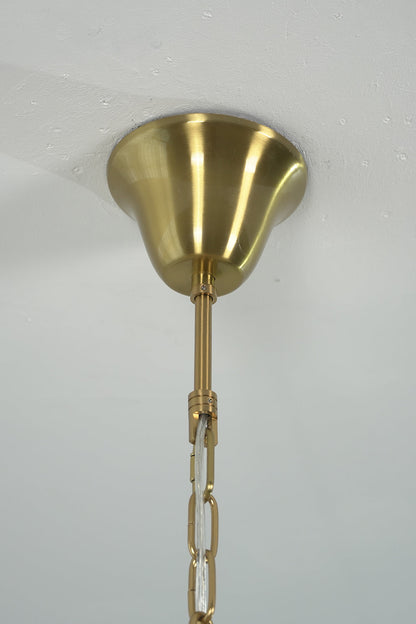 Brass finish ceiling canopy and chain detail | Metal | Close-up of the mounting hardware for chandelier | vexa lamps