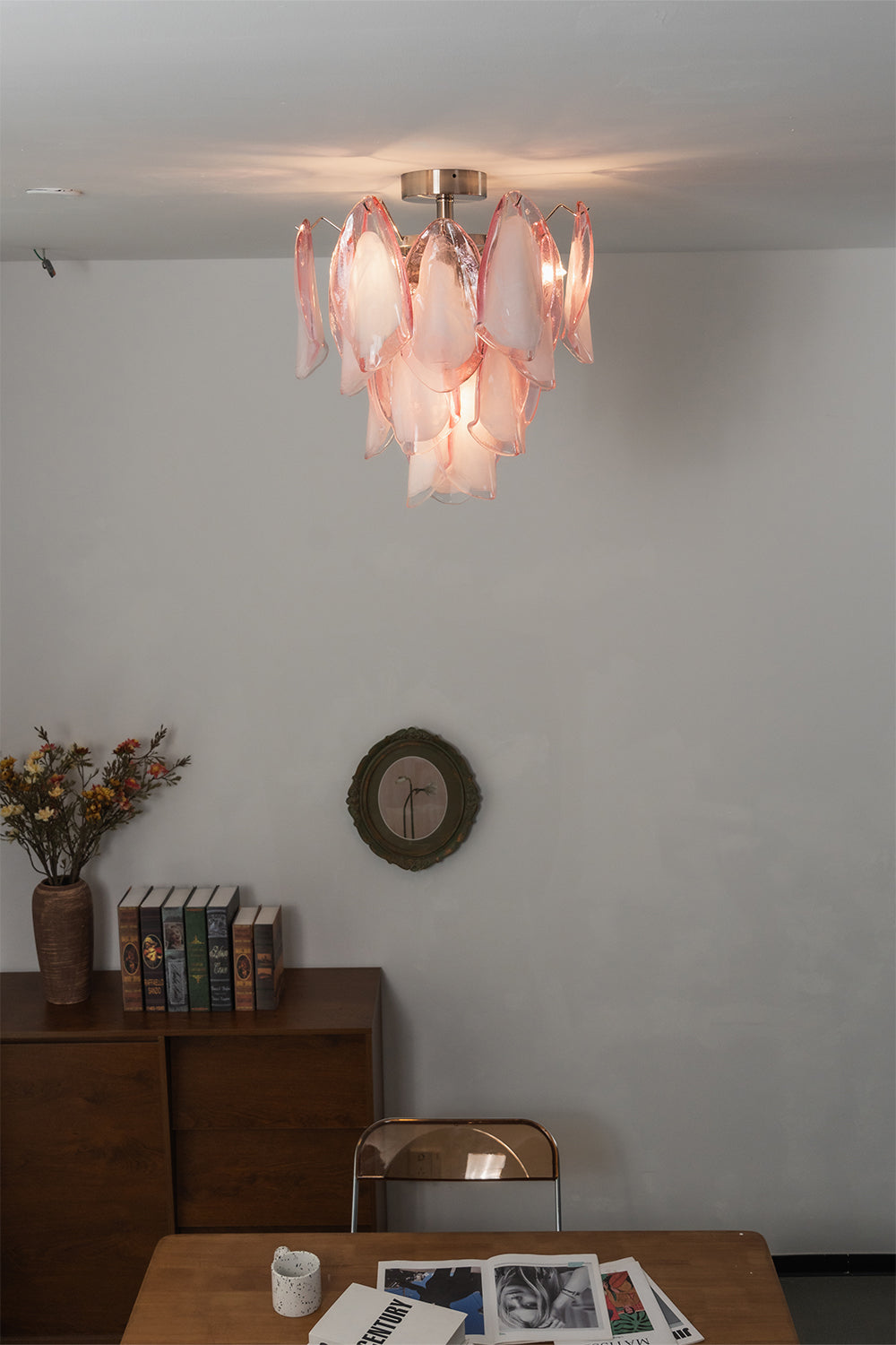 Lit Seraph petal glass ceiling lamp with warm glow | Metal, Glass | Studio setting showing the soft light diffusion | vexa lamps