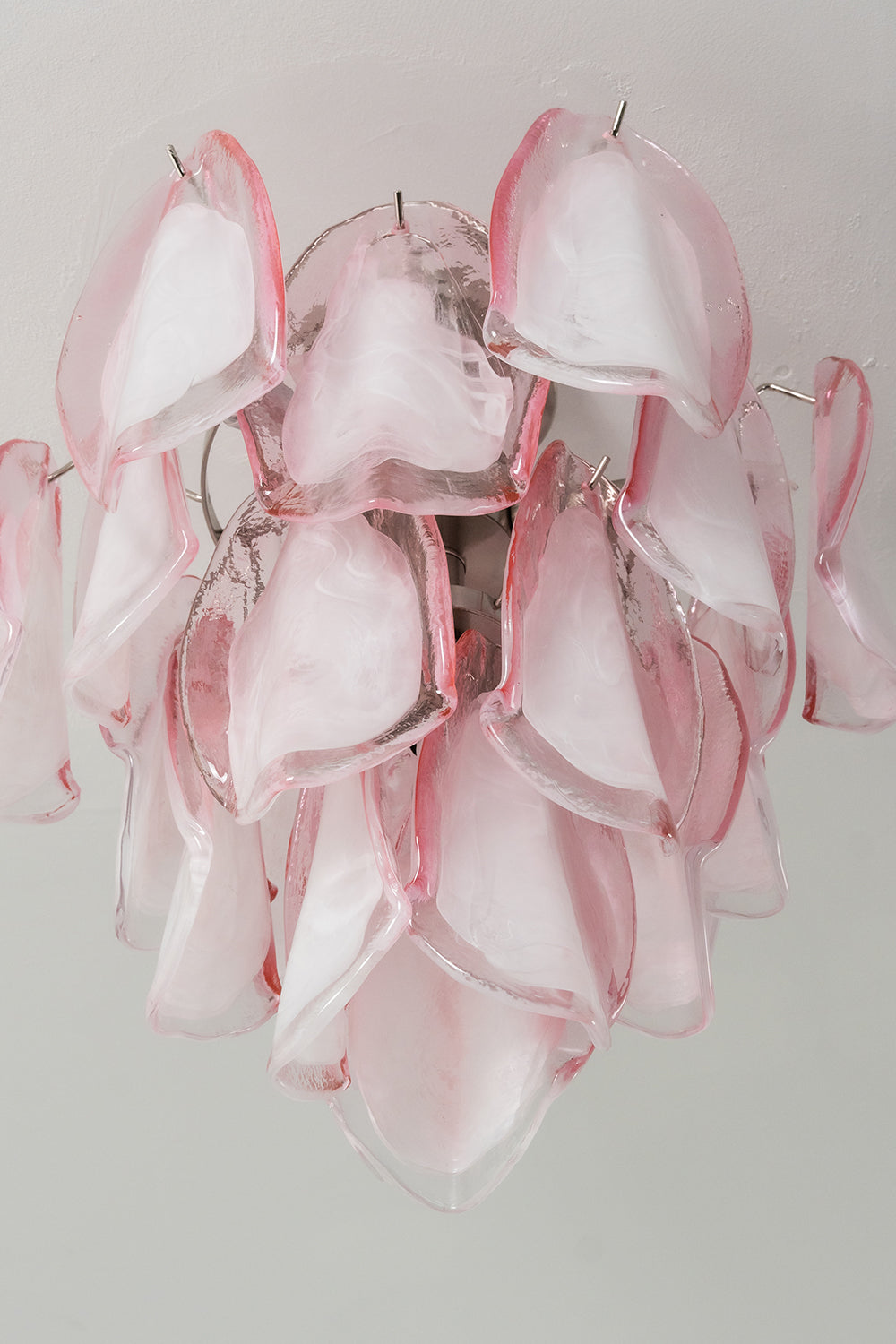 Front detailed view of pink petal glass ceiling light | Metal, Glass | Focused on the arrangement of the glass petals | vexa lamps