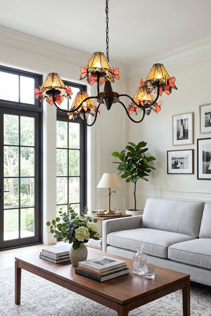 Seraphina Stained Glass Chandelier | Glass, Metal | Positioned as central lighting in a sunlit living room with comfortable grey sofas and a wooden coffee table | vexa lamps