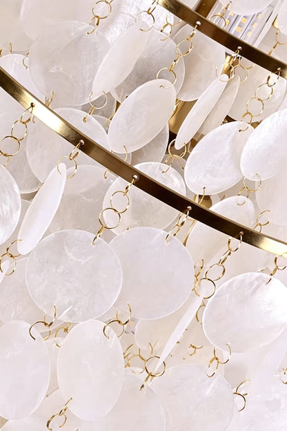 Internal iron frame detail of shell lamp | Shell | Iron | Close-up of gold-finish rings and shell attachments | vexa lamps