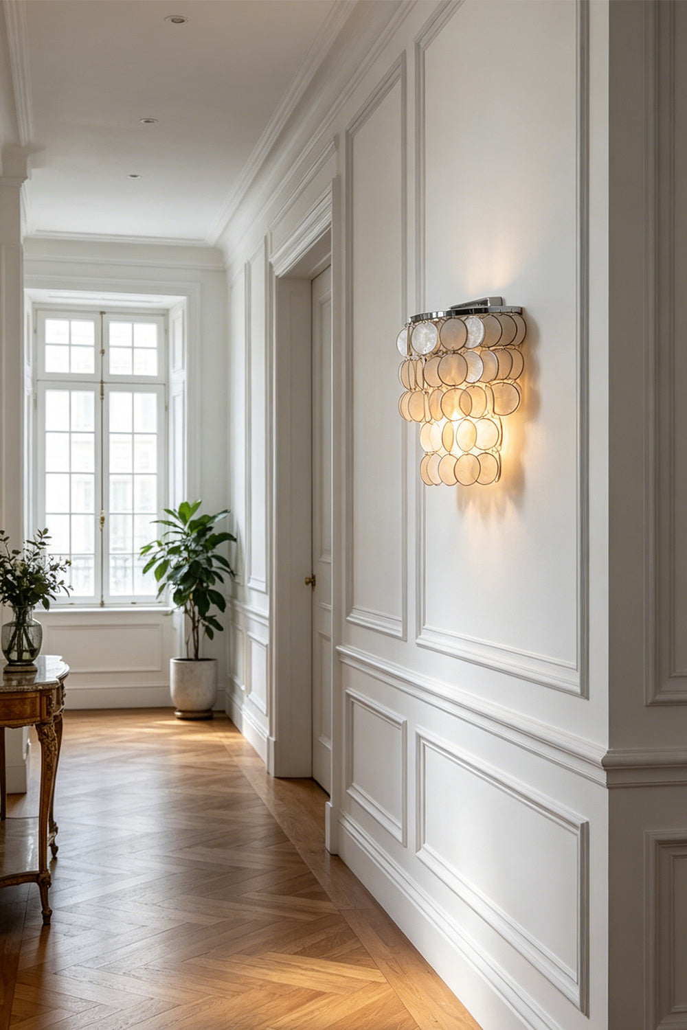 Capiz shell wall light in hallway | Shell | Iron | View showing a bright corridor with wall molding | vexa lamps