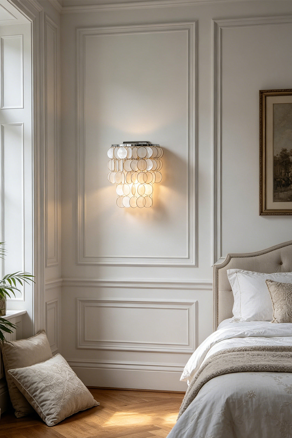 Shimmering Capiz shell wall lamp | Shell | Iron | Bedroom corner scene with neutral tones | vexa lamps