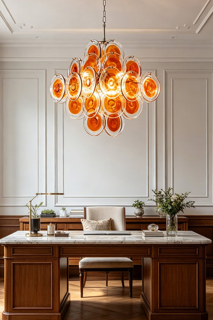Grand Solari Amber Glass Chandelier | Metal, Glass | Centered view in a luxury study over a white-top desk | vexa lamps