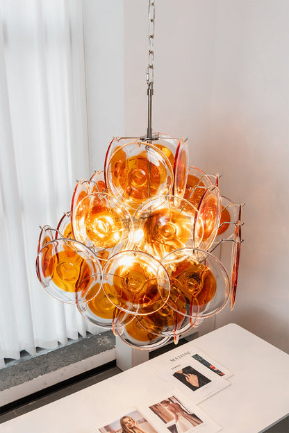 Solari Amber Glass Chandelier | Metal, Glass | High-angle perspective over a desk with open books | vexa lamps