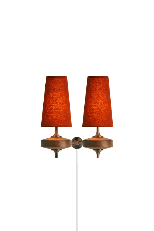 Spindle Walnut Wood Wall Sconce featuring two tapered fabric shades and an antique brass base for stylish accent lighting.