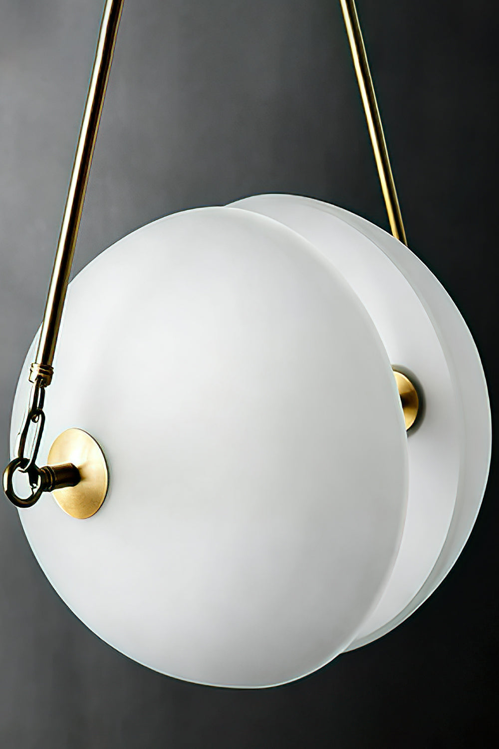 Low-angle close-up of split glass hemispheres | Glass, Metal | Showing the matte white finish and central rod | vexa lamps