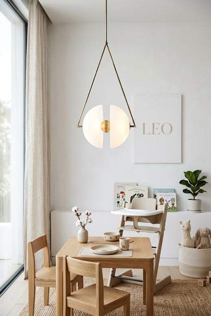 Oyster glass pendant light for nursery | Metal, Glass | Installed over a small wooden table and chairs | vexa lamps