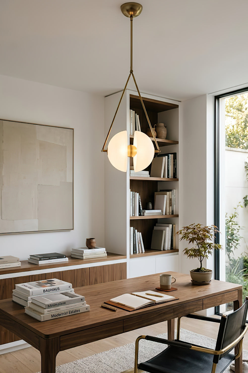 Split hemisphere oyster glass pendant | Metal, Glass | Centered in a home library over a large desk | vexa lamps