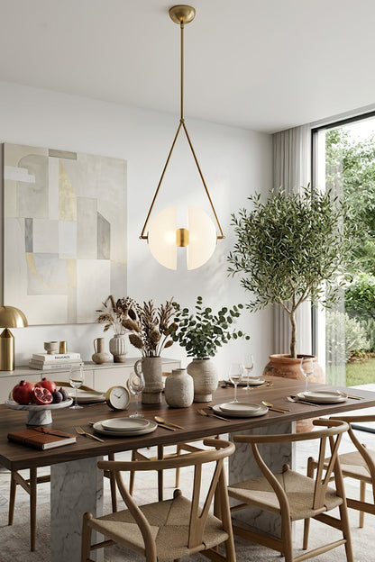 Modern split hemisphere pendant light | Metal, Glass | Dining area scene with plants and natural light | vexa lamps