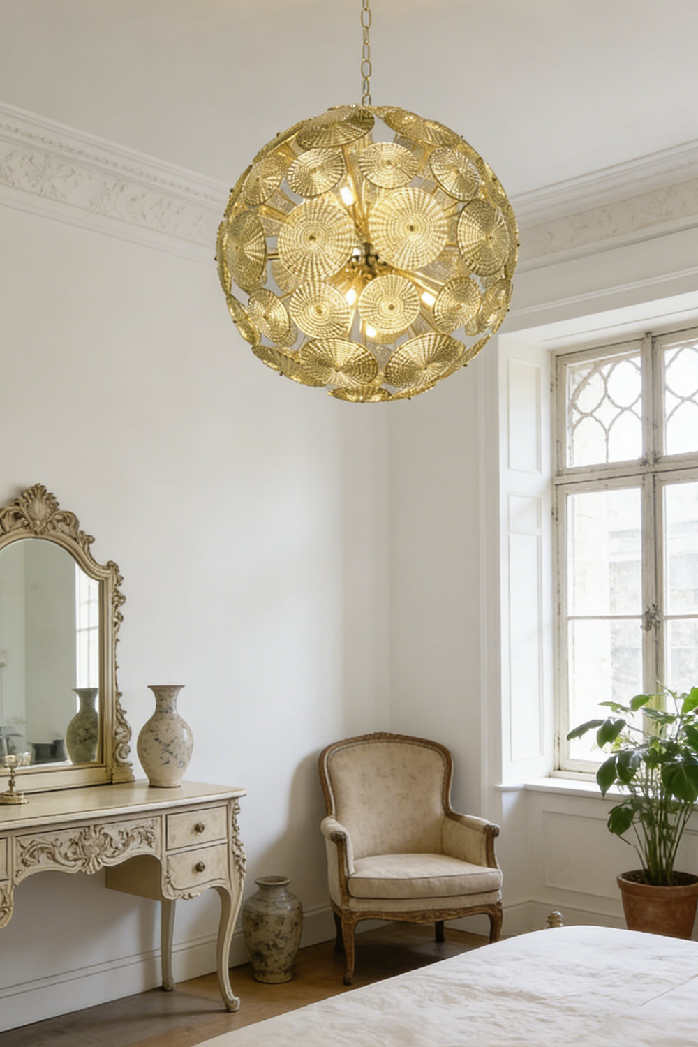 Lit spherical glass disc chandelier | Metal, Glass | Installed in a sunlit living room corner | everlamps