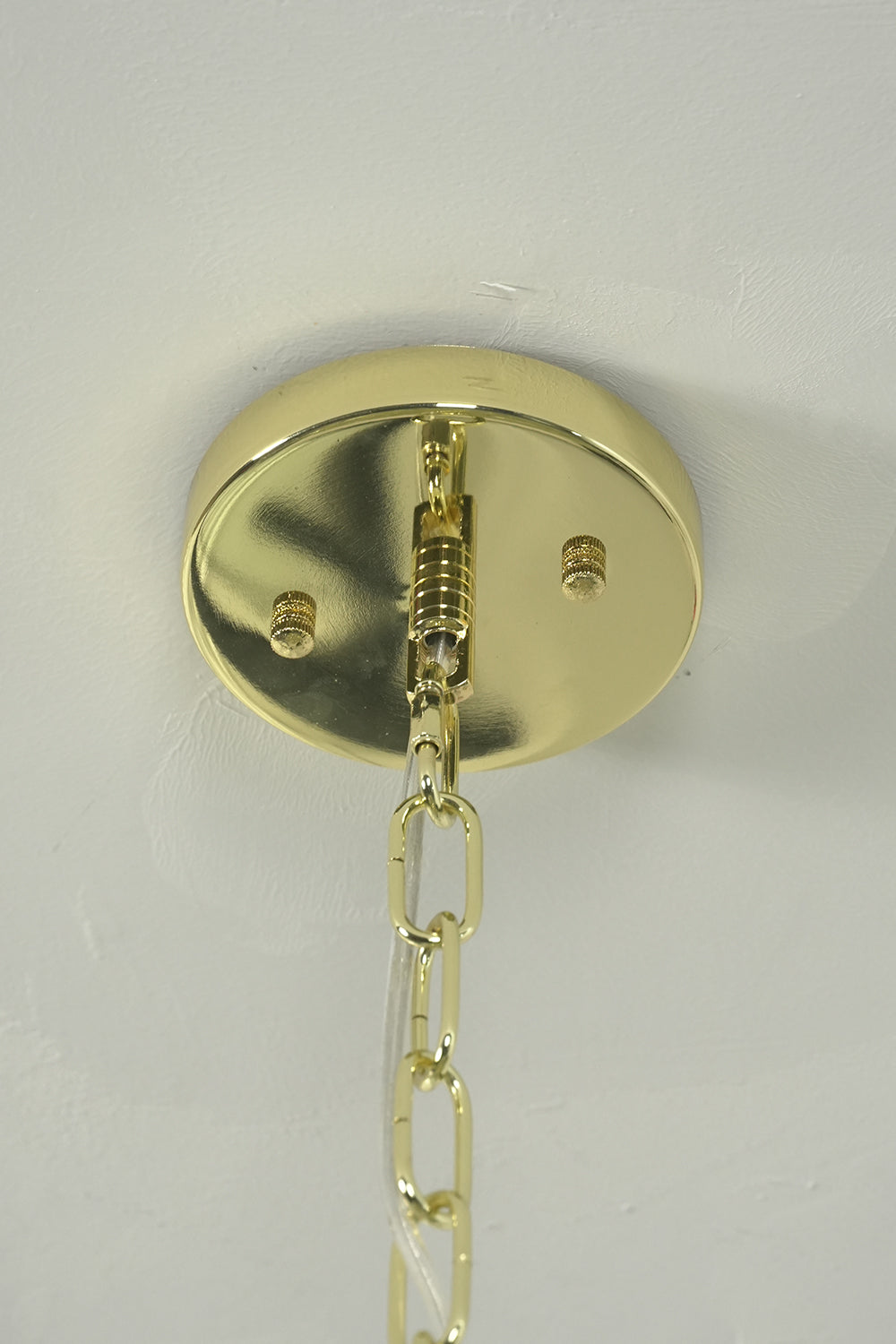 Brass ceiling canopy and chain detail | Metal | Showing functional connection and screws | everlamps