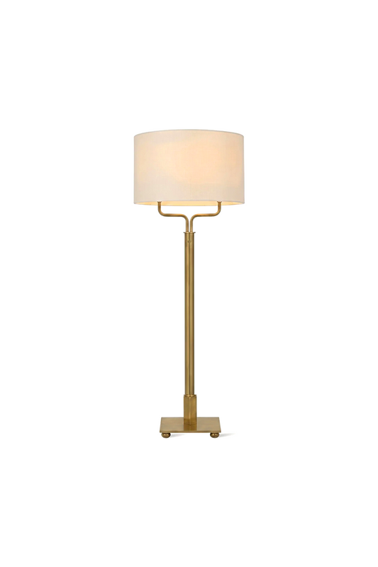 Sutton Modern Brass Floor Lamp with white linen drum shade and antique brass finish.
