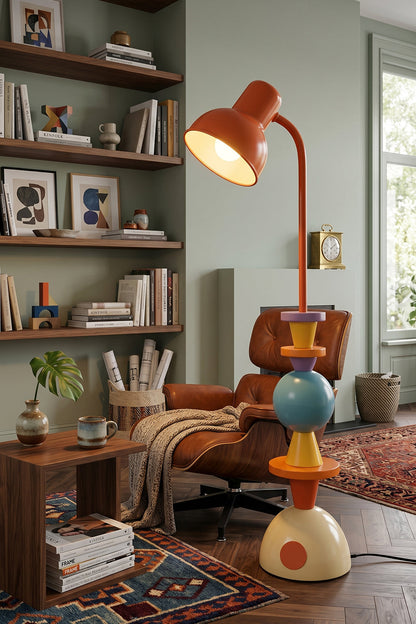 Tectonic Prism Metal Floor Lamp | Metal | Illuminating a cozy reading corner with a leather lounge chair and rustic shelving | vexa lamps