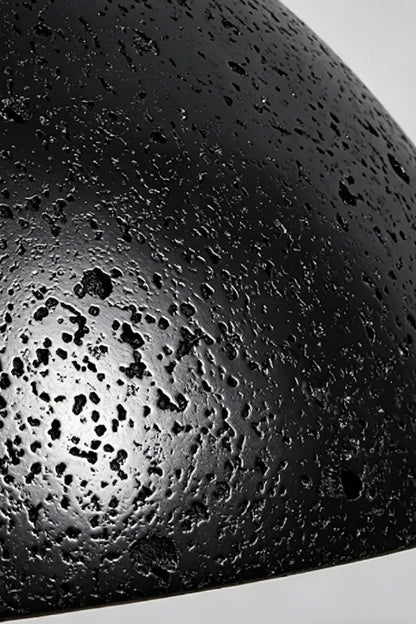 Tectonic Vein Travertine Detail | Black Travertine | Close-up of porous stone texture and rough veining | vexa lamps