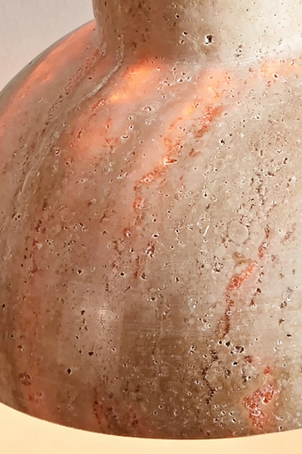 Tectonic Vein Travertine Detail | Pink Vein Travertine, Gold Metal | Close-up of colorful veining and gold rim | vexa lamps