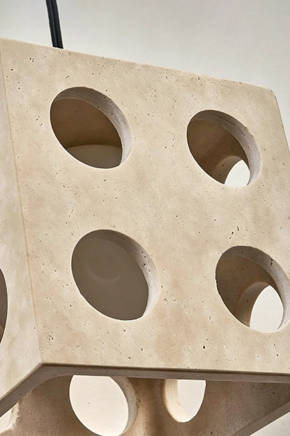 Terra Cube Travertine Pendant Light | Travertine, Metal | Close-up detail of unlit stone and hardware | vexa lamps