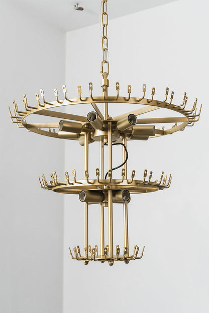 Thalassa Aquamarine Textured Glass Chandelier | Glass, Metal | Clear view of the raw unlit double-tiered gold brass frame skeleton showing empty ring bands with hooks for glass attachment | Detail shot | vexa lamps