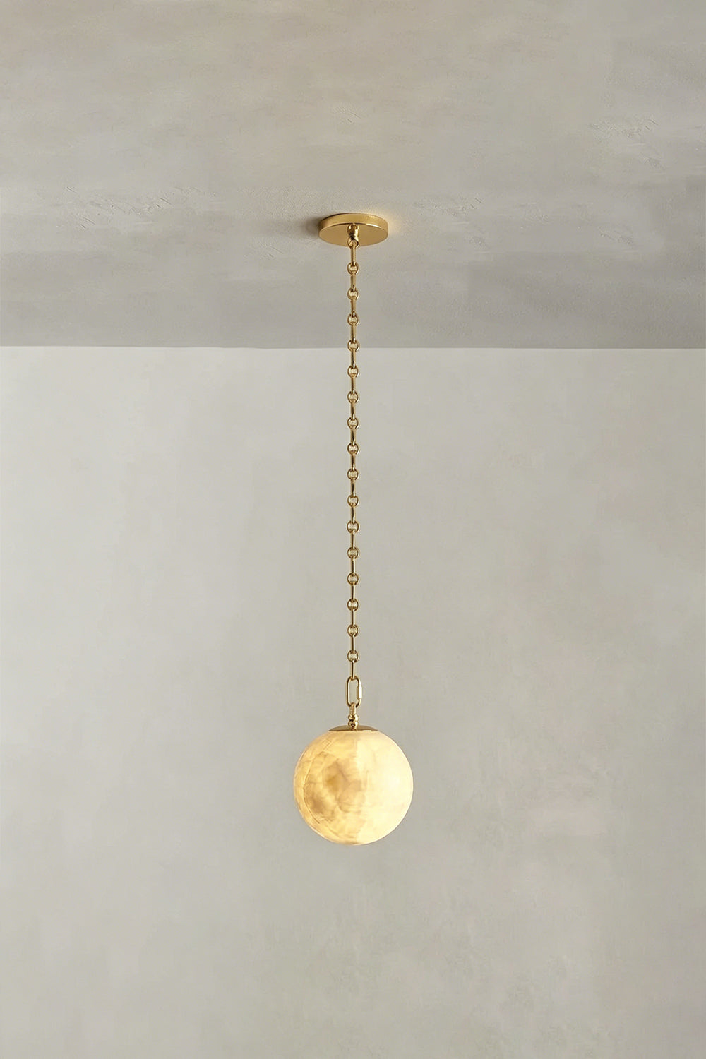Thalia Alabaster Spherical Chain Chandelier with hand-carved alabaster spheres and brushed links.