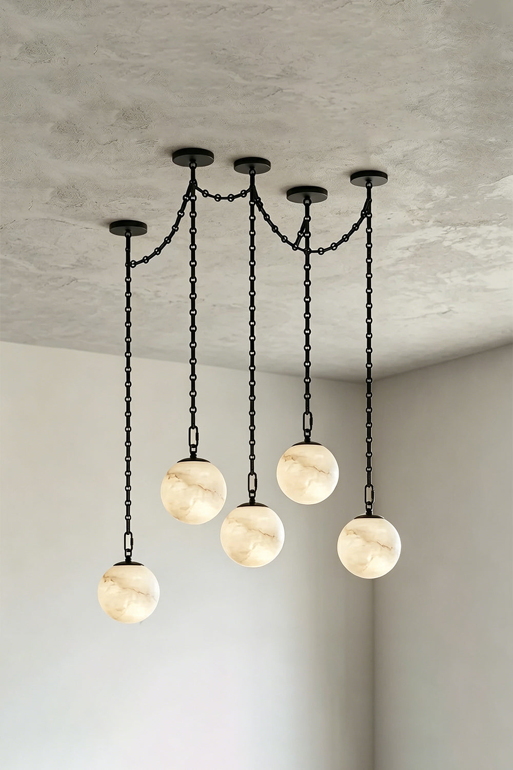 Thalia Alabaster Spherical Chain Chandelier with hand-carved alabaster spheres and brushed links.