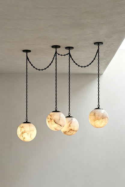 Thalia Alabaster Spherical Chain Chandelier with hand-carved alabaster spheres and brushed links.